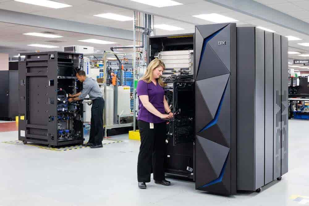 Workers assembling and testing Z mainframes